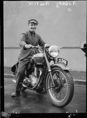 Aubrey Milton Austin posing on his BSA motorycle