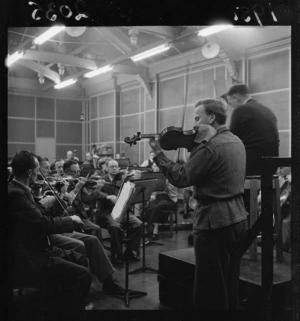 Yehudi Menuhin practising with the National Orchestra