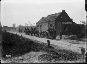 A 60 pounder gun going forward through the captured village of Bertincourt, France, during World War I