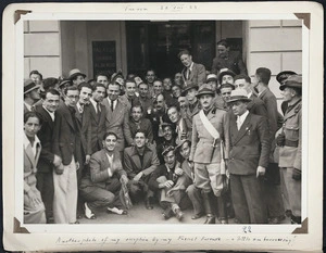 Photograph of Jack Lovelock being greeted on his arrival in Turin