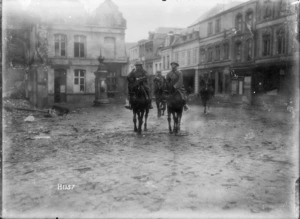 Divisional commanders entering Le Quesnoy, France, after its capture