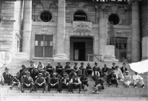 Men, on the steps of the uncompleted Parliament Buildings