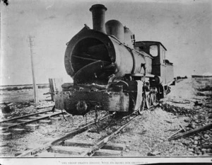 Locomotive involved in a train crash near Rakaia, Canterbury - Possibly taken by a photographer for the Press newspaper