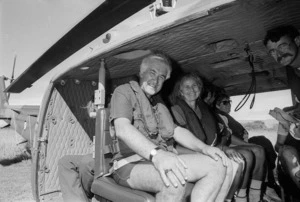 Governor General, Sir Paul Reeves, and Lady Reeves, seated in a RNZAF Iroquois helicopter, about to depart Mana Island, Porirua, Wellington - Photograph taken by Merv Griffiths