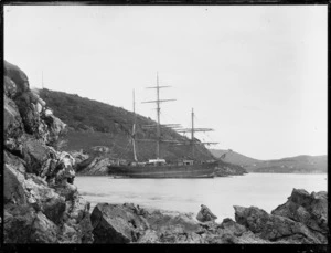 Sailing ship Alcestis run aground, probably in Otago Harbour.