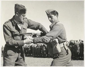 New Zealand instructor and Greek Army trainee with a tommy gun, Palestine