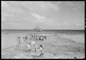 Men unloading cargo, Mauke Island, Cook Islands - Photograph taken by Mr Malloy