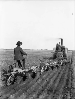 Ploughing, using a traction engine and 3 triple furrow ploughs
