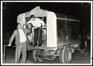 Unloading a truck holding items for a New Theatre production - Photograph taken by C W Pascoe