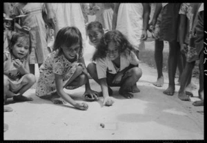 Children playing marbles, Mauke Island, Cook Islands - Photograph taken by Mr Malloy