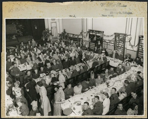Group at Saturday night dinner, YWCA hostel, Boulcott street, Wellington - Photograph taken by William Hall Raine