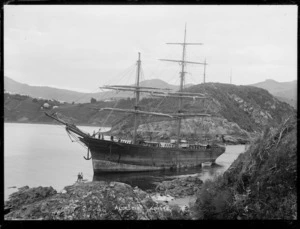 Sailing ship Alcestis run aground, probably in Otago Harbour.