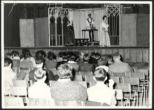 Audience watching a New Theatre production in a school hall - Photograph taken by C W Pascoe