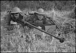 New Zealand World War II soldiers training in England, with an anti tank rifle