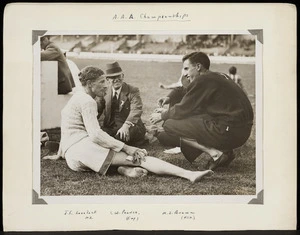 Photograph of Jack Lovelock talking to Keith Brown