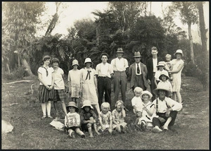 Group of adults and children, Mokau River