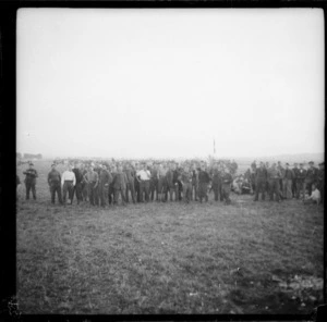 Ex-prisoners of war waiting on airstrip - Photograph taken by Lee Hill