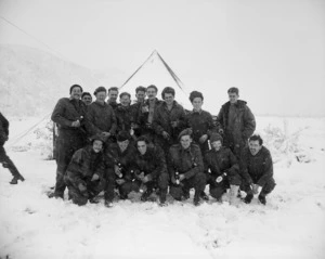 [163 Battery personnel outside the mess tent after Christmas dinner]