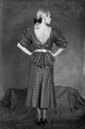 Evening skirt and blouse, in black and gold leather, designed by Kay Cohen and modelled by Lorraine Downes - Photograph taken by William West