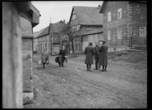 Civilians and prisoners of war in German village - Photograph taken by Lee Hill