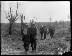 Wounded prisoners coming in near Messines, Western Front