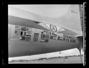 Insignia and flags of countries visited on the 100th day world tour of the airplane NC37734 Atlas Sky Merchant, Whenuapai Air Base, Waitakere City, Auckland