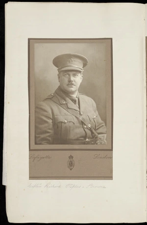 Page from scrapbook with photograph of Captain Richard Staples-Browne