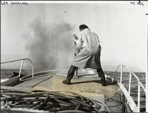 T Perano firing a harpoon from a whalechaser in Tory Channel, Marlborough