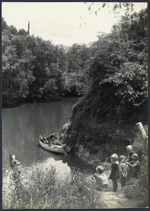 Teacher and pupils in a boat on the Mokau River