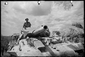 World War II soldier from New Zealand, 2nd Lieutenant H W Tingey, in the turret of a M10 (tank buster), in a forward area near Florence, Italy - Photograph taken by George Kaye