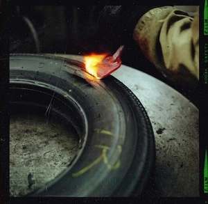 Hot-iron repair to a car tyre sidewall, Dunlop tyre factory at Upper Hutt