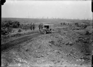 A motor car passing a huge shell hole in captured ground, Grevillers, World War I