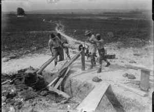 New Zealand artillerymen building a gun emplacement at Beaussart, France, during World War I