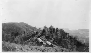 Mens bach at ore and lime deposits, Onekaka Iron and Steel Company