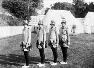 Four members of a relay team line up for a photograph