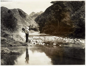 Woman by Little Wanganui River or Wangapeka River