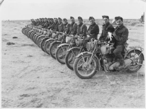 New Zealand despatch riders on motorcycles at Tobruk during Libyan campaign, World War II - Photograph taken by P E Coutts