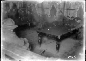 Soldiers playing billiards inside the YMCA hut in France