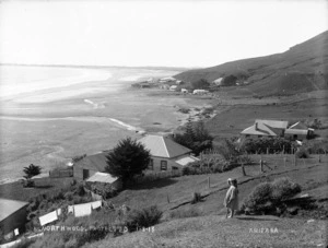Settlement, beach and young girl, Ahipara