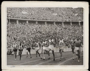 Photograph of Jack Lovelock and the other 1500 metres finalists just after the start of the Olympic final