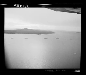 Royal New Zealand Navy ships with the naval flotilla entering Rangitoto Channel, Auckland