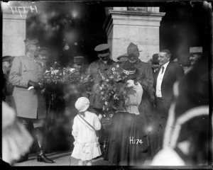 New Zealand receiving a bouquet at the Fete National celebrations in France during World War I