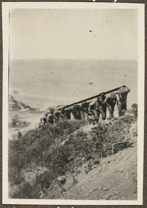 Maori soldiers carrying iron girders, Gallipoli, Turkey