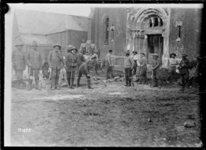 New Zealand Pioneers filling in a mine crater outside a church in Beauvois, World War I