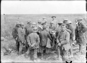 New Zealand soldiers examining German prisoners' papers, World War I
