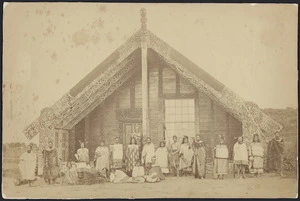 Maori group outside Tamatekapua meeting house, Ohinemutu, Rotorua - Photograph taken by Herbert Deveril