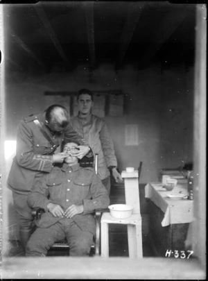Taking a cast for fitting new dentures for a soldier during World War I