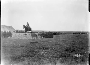 A horse jumping at the New Zealand Infantry Brigade horse show, France