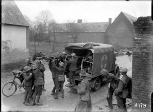 Wounded World War I New Zealand soldiers being placed in an ambulance, France