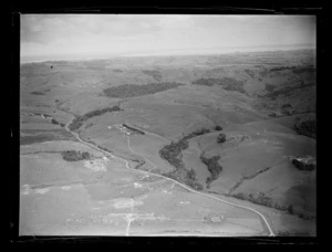 View of Kirkup's Farm and surrounding farmland with roads and neighbouring properties, Auckland